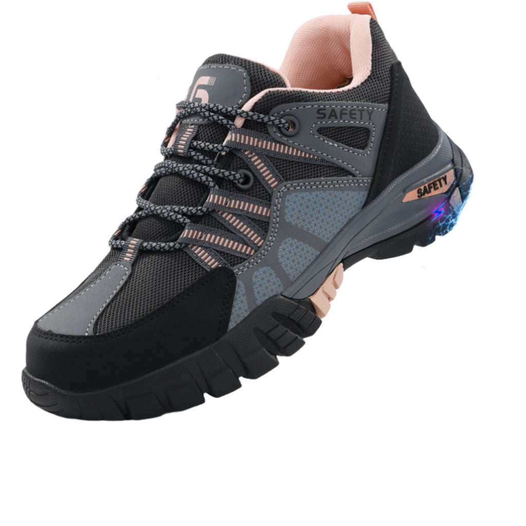 A side profile of SafeStep Lady women's safety sneakers in black, grey, and pink, featuring a durable reinforced upper and anti-fatigue cushioning sole.